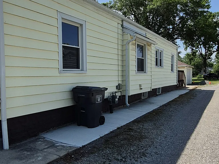 Side of house along alley