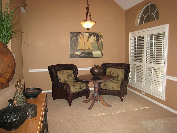 Cozy Dining Area with Plantation Shutters