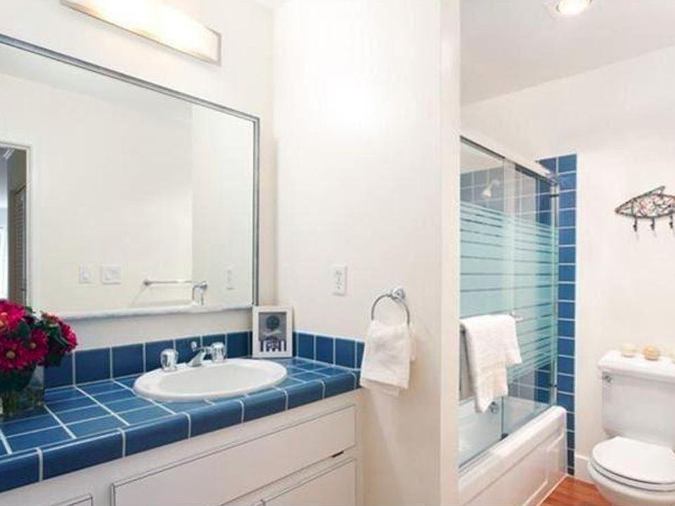 Bathroom with shower and bathtub