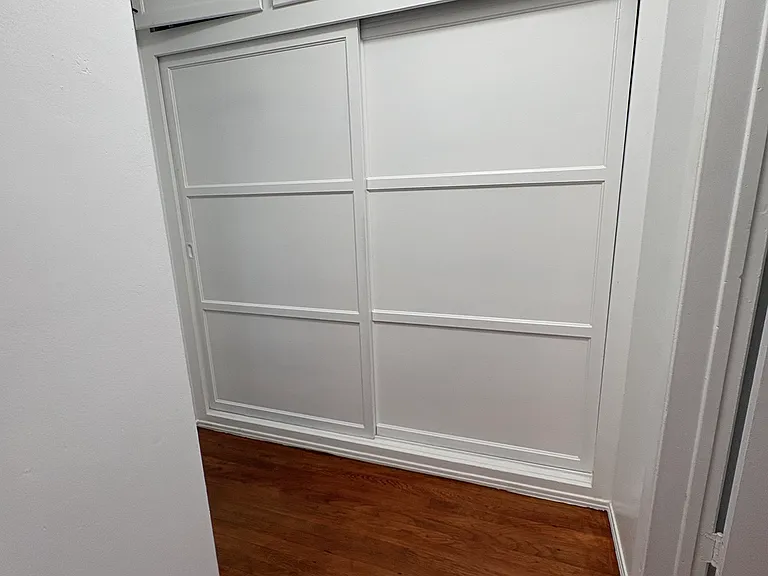 Hallway with closet space and between room and bathroom for additional privacy!