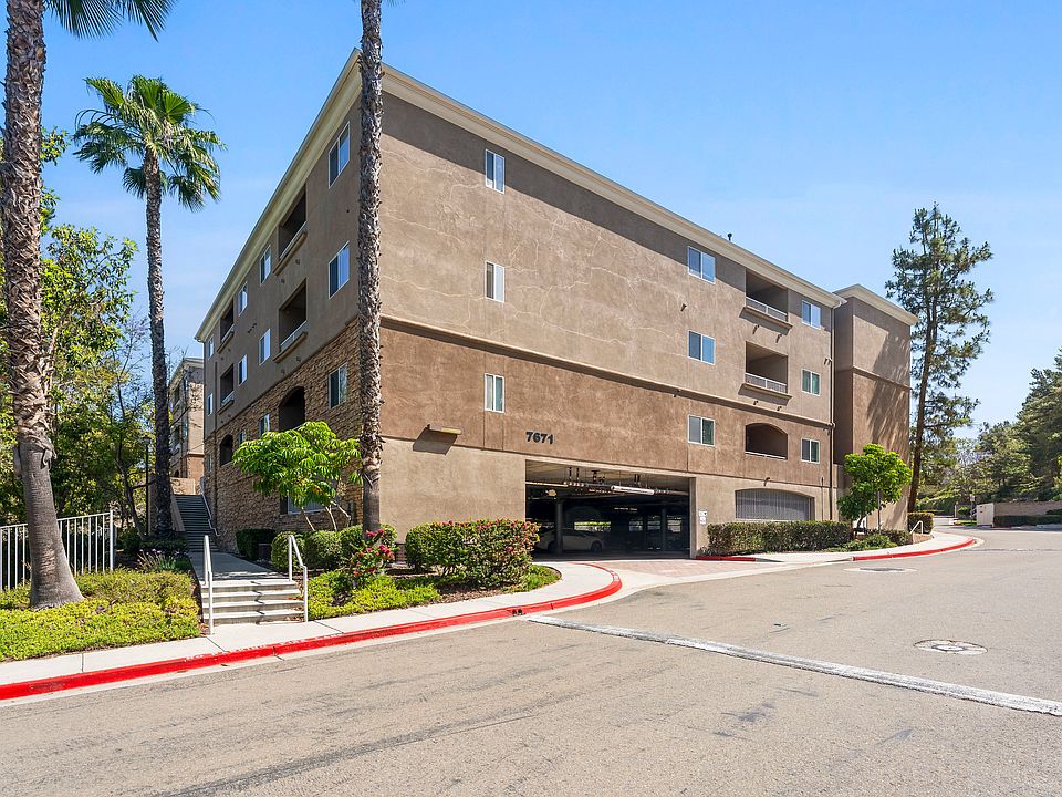 Building entrance with parking garage.