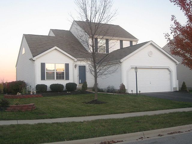 Attractive curb appeal with lush landscape, 2 car attached garage with opener.
