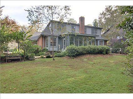 Large, level back yard with pond and watefall