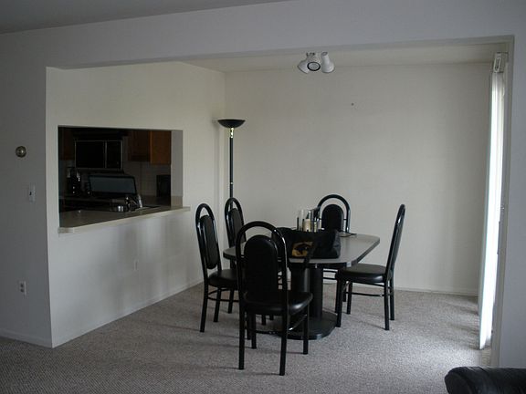 Dining Room w/sliders to balcony overlooking city