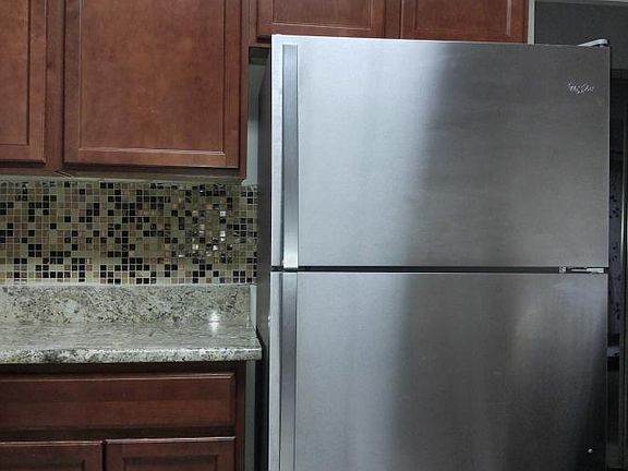 Updated Kitchen with Granite, Stainless Appliances and Backsplash