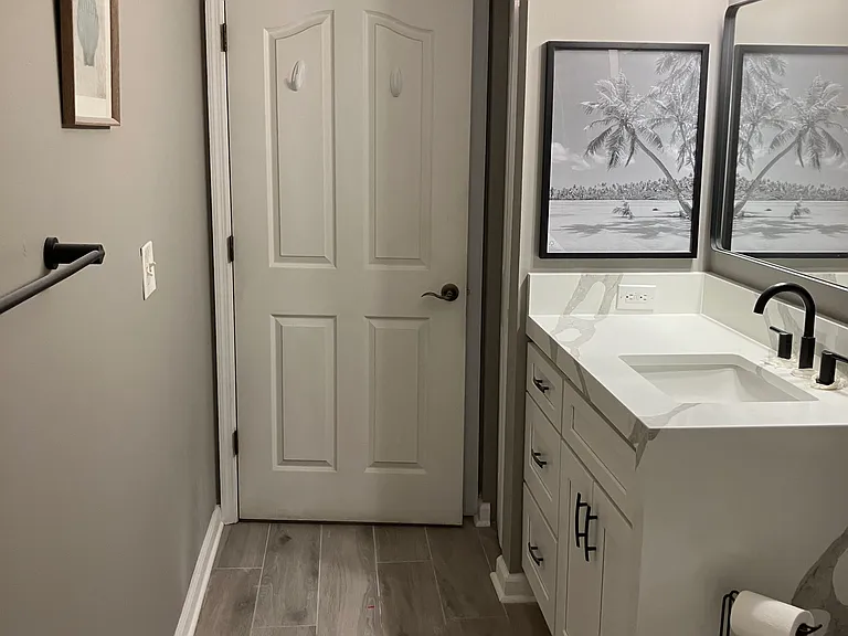 Quartz waterfall over the vanity.