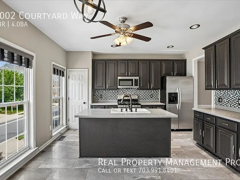 7002 Courtyard Way — Photo 16