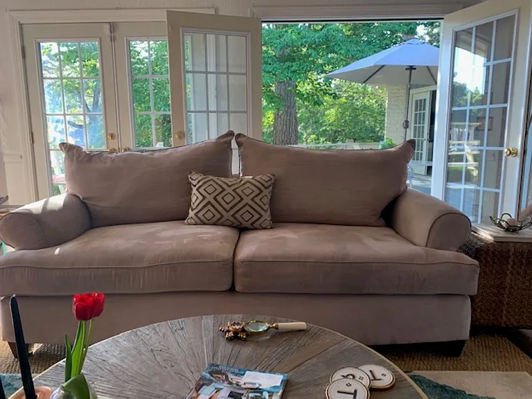 Den/TV room with french doors flowing onto deck