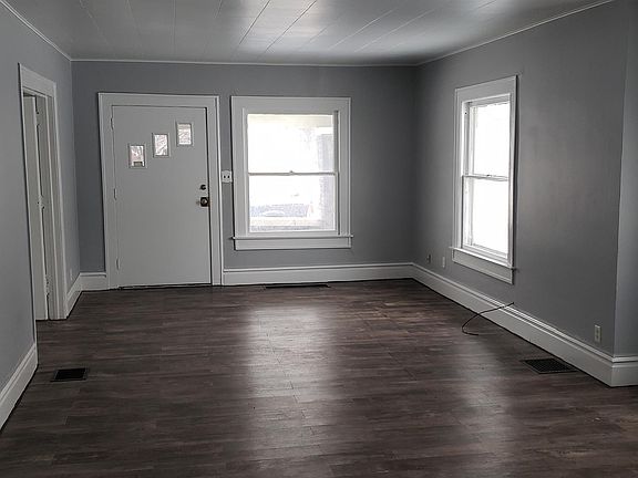 View from the kitchen looking into the front rooms.