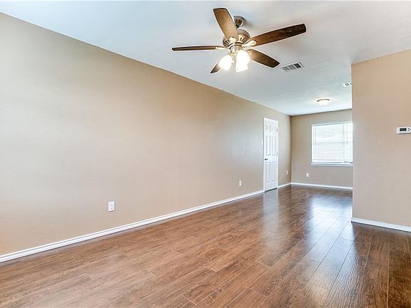 Living Dining and gorgeous wood like nice laminate floors throughout.
