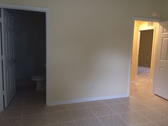 Master bedroom with attached bathroom