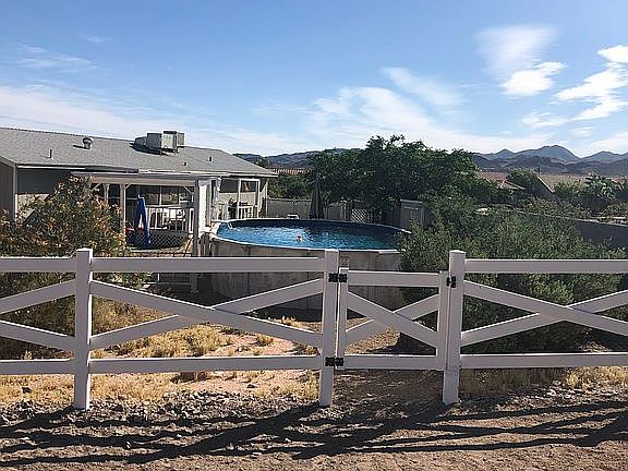 Back of house view of pool
