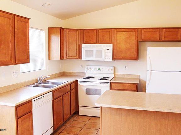 5th image of 10901 W Wilshire Dr