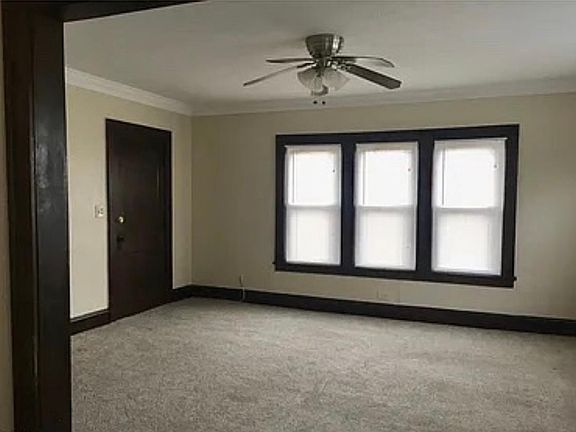 Beautiful natural hardwood with cream paint is sure to match any interior color palette.