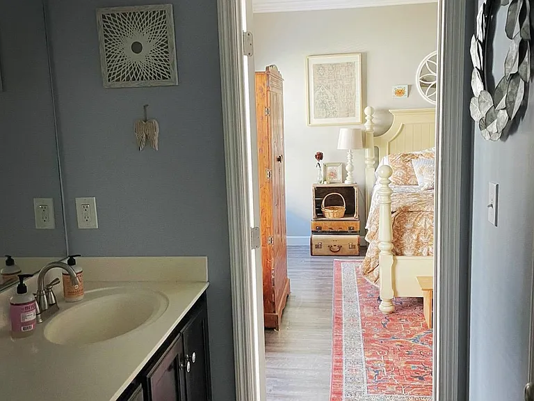 View from master bathroom into master bedroom.