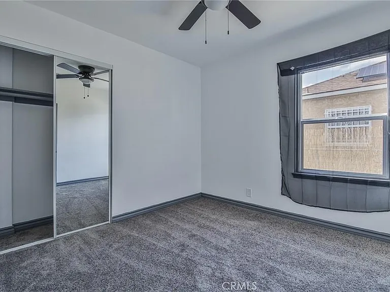 1st bedroom: new carpet, large closet, fan and new windows