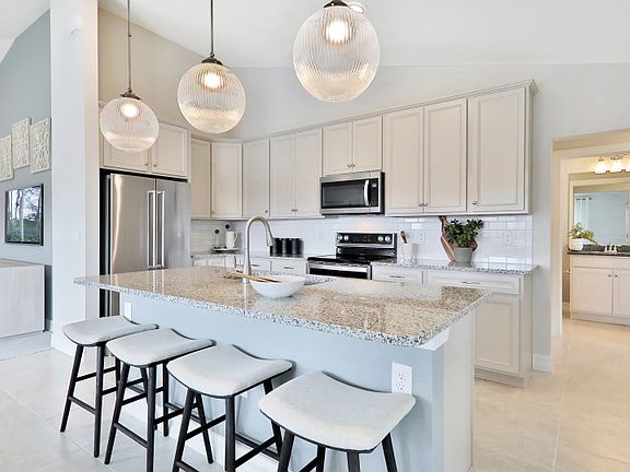 Model Representation Large kitchen island, a great place for a breakfast bar or quick meal on the g