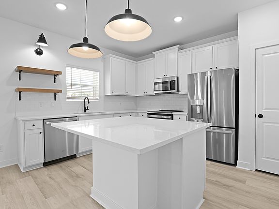 Kitchen featuring vast island