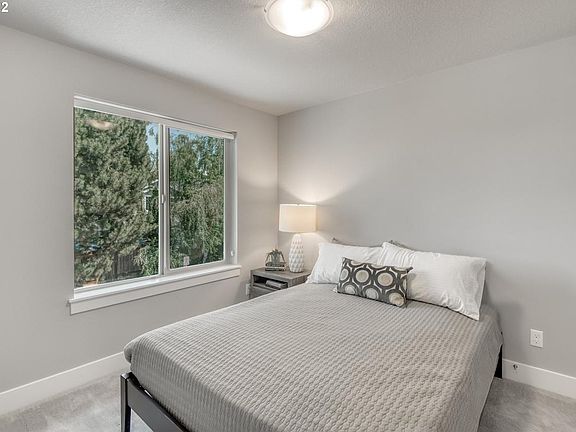 Queen bed in photo