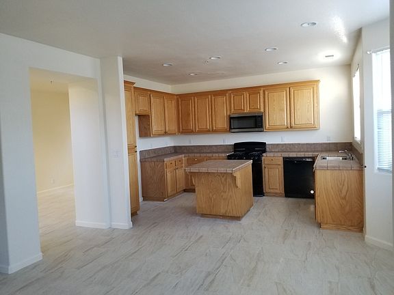 Kitchen + kitchen island.