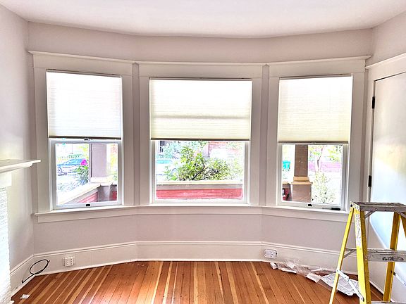 premium custom blinds and fresh coat of sherwin williams paint "incredible white"