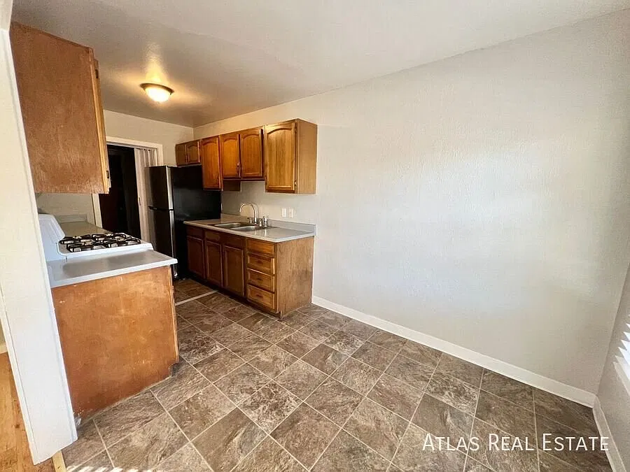 Charming 2-bedroom Home with Yard & Shared Garage! Available this November — Photo 2