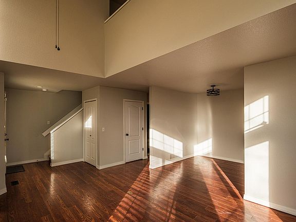 Living room and dining room and second floor opening