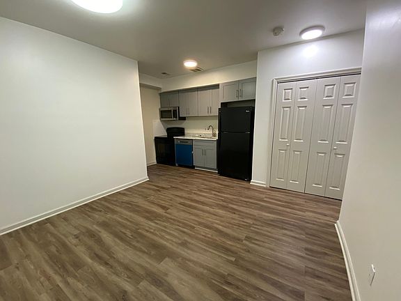 living room opened to kitchen