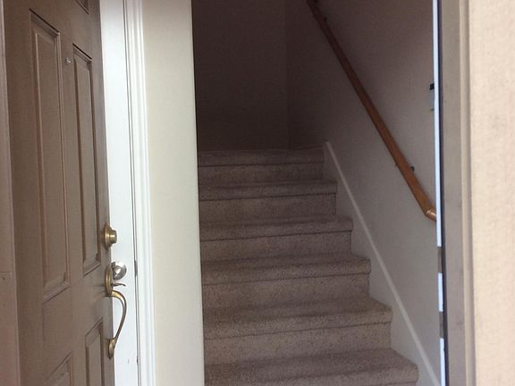 Stairs entering unit. (Entire living space is upstairs.)