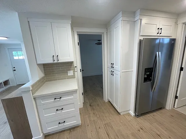 Coffee/wine bar area off the living space. Lots of drawers an storage in the kitchen