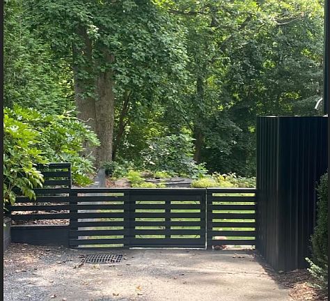 Driveway and Fenced In Garden Leading to Private Entrance.