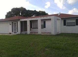 5945 Della Dr, Holiday, FL 34690