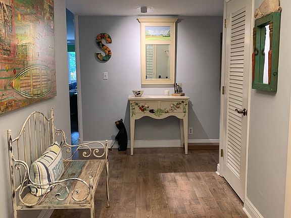 Front entry hall with coat closet and utility closet