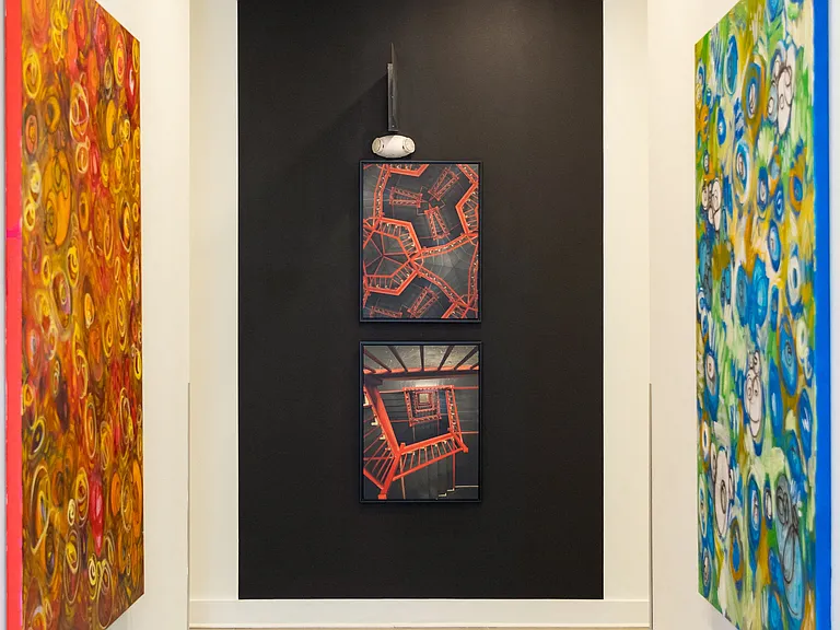 Colorful Hallway Art Gallery Featuring Abstract and Geometric Pieces