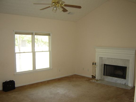 Greatroom with Ceiling Fan & Fireplace