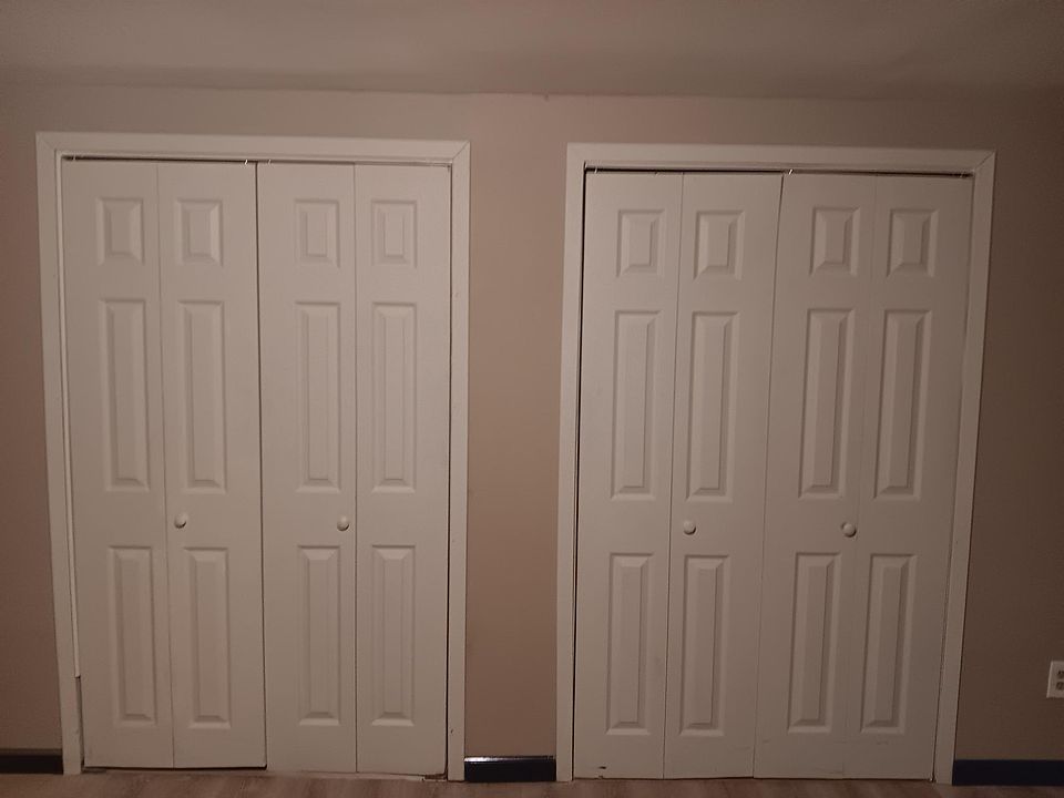 Bedroom with huge double closets