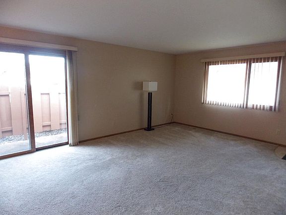 The patio doors and large windows allow for plenty of natural lighting for the main floor.
