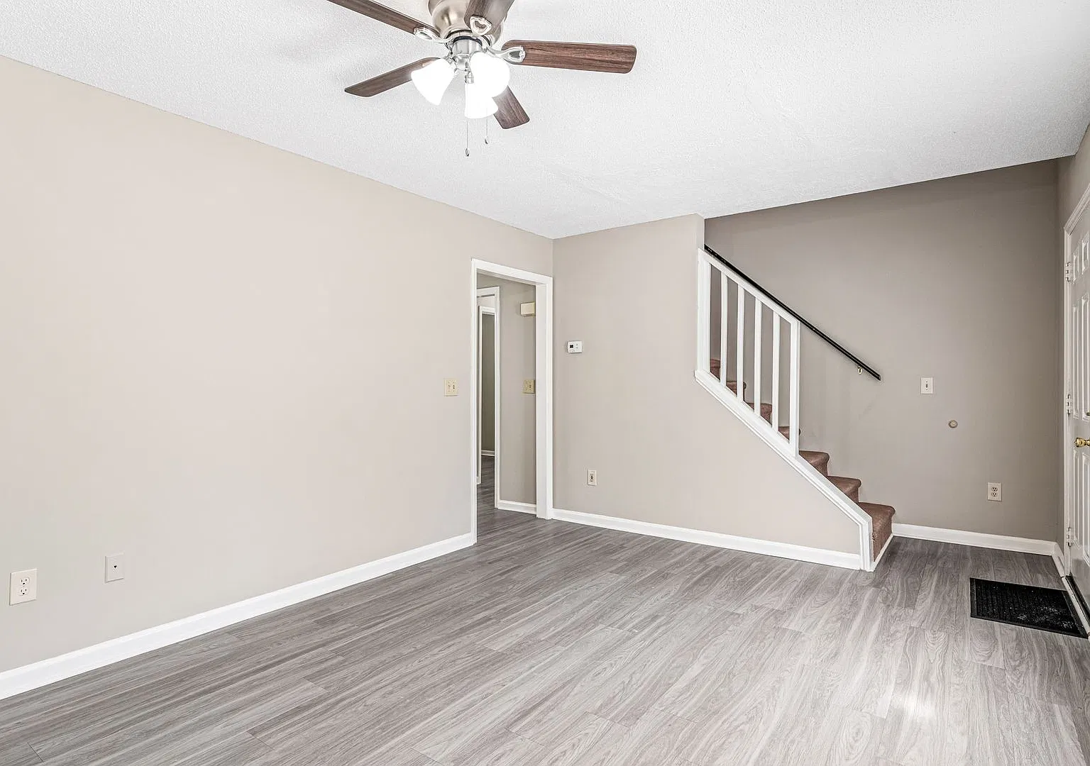 NE Two Story Home, Several Updates, Wood like flooring downstairs, Ceiling Fans, Deck, Must See! — Photo 3
