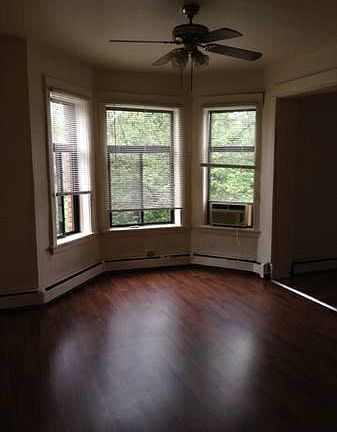 Living room with bay windows