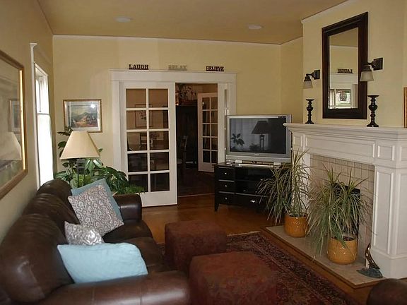 Looking west from living room into dining room, showing pocket doors.