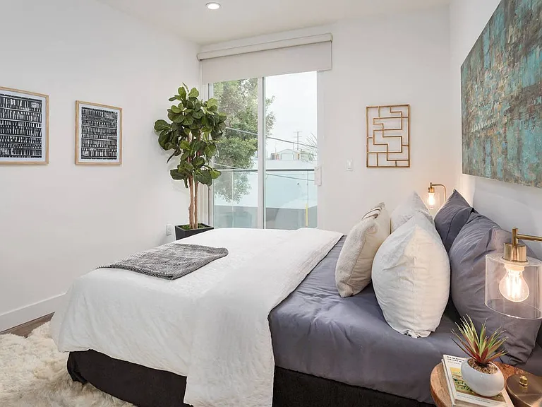 Bedroom with Large Windows with Shade