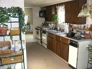 4th image of 11951 Village Way NW