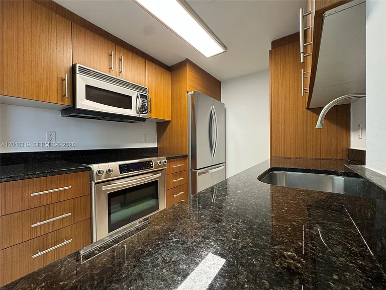 10275 Collins Ave #318 — Photo 11
