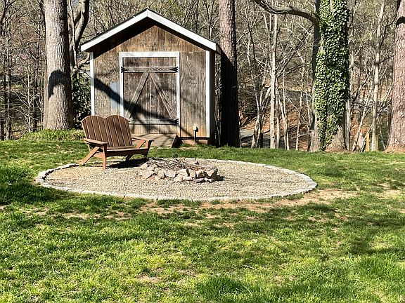 Backyard fire pit and shed