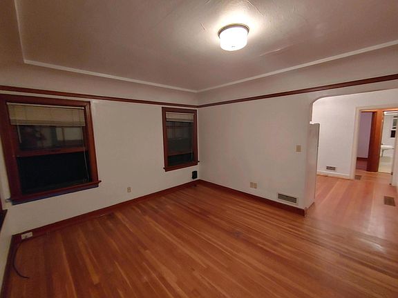 living room and entrance to kitchen