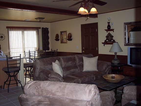 View of living room and kitchen as you walk into Town home