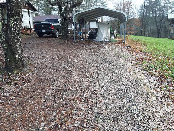Bottom of drive way. Truck is parked in the yard.