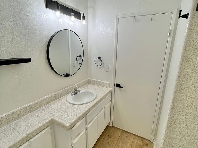 Top-Floor 2BD/1BA with Private Deck — Photo 10