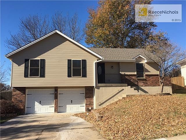 Brand new roof, gutters, garage doors, vinyl siding, front door, shutters, windows and railing!