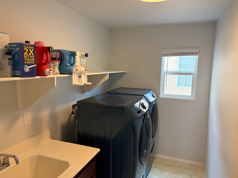 Convenient upstairs laundry room. Samsung washer and dryer included.